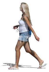 blond and long-haired woman walking