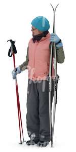 cut out woman standing with skis