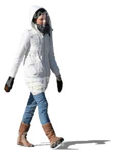 cut out woman in a white winter jacket walking