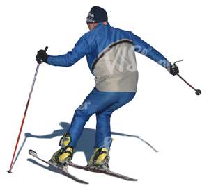 cut out man skiing downhill