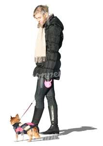 cut out woman standing with a dog in winter