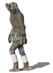 cut out woman in a winter coat walking