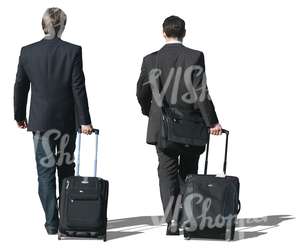 two travelling businessmen walking with suitcases