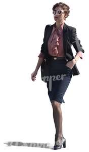 businesswoman with sunglasses walking