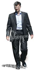 businessman in a black suit walking