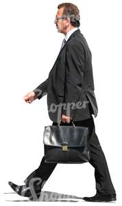 businessman walking with briefcase in hand