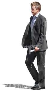 cut out young businessman walking