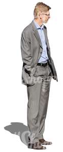 cut out man in a grey suit standing