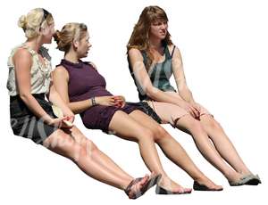 three women sitting on the bench