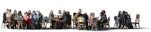 large cut out group of people hanging in a cafe