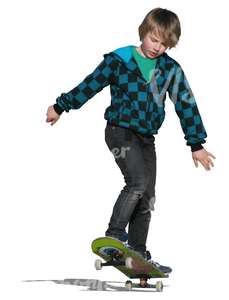 cut out boy riding a skateboard