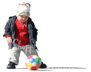 cut out boy playing with a ball