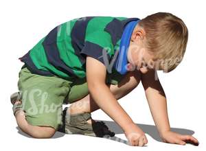 cut out boy playing on the ground