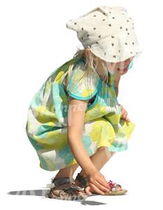 cut out girl in a summer dress squatting
