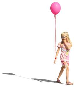 blond girl walking with a balloon in her hand