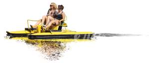 two women riding a pedalo