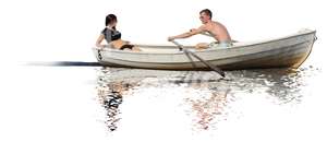 couple rowing a boat