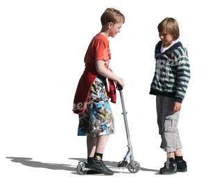 two boys with a scooter standing and talking 