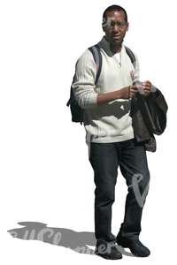 cut out black man in a white sweater walking