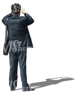 cut out asian businessman standing and taking a picture