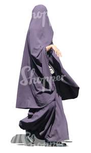 muslim woman in a purple abaya walking