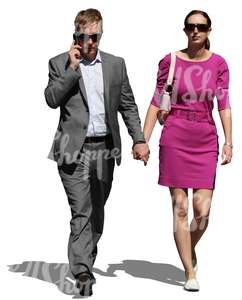 couple im formal clothes walking hand in hand