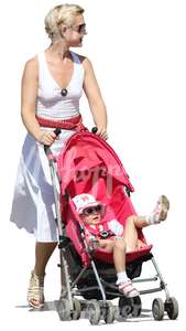 woman in a dress pushing a stroller