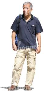 elderly asian man walking