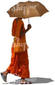 cut out buddhist monk walking with an umbrella