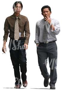 two asian businessman walking and smoking