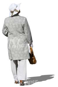 elderly woman with a hat walking