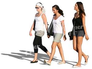 three women walking in summertime
