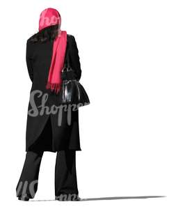 woman in a black winter coat standing