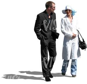 formally dressed man and woman walking