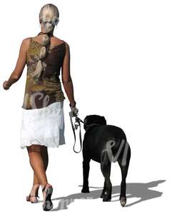 woman walking a dog