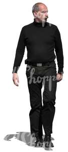 man in a black outfit walking