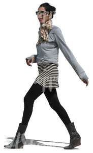 woman in a striped skirt walking