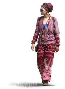 woman in a pink bohemian outfit walking