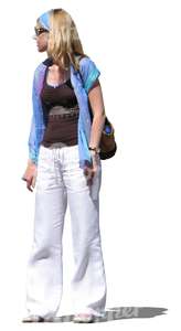 woman in white summer trousers standing