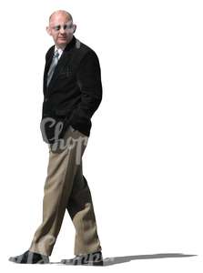 elderly businessman walking