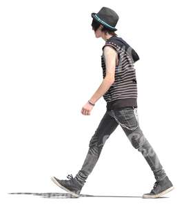 young man in punk style outfit walking