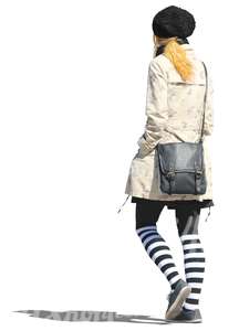 woman in striped stockings walking