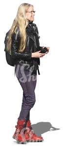 blonde woman in a leather jacket standing