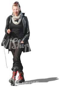 punk woman dressed in black walking