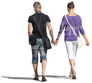 couple walking hand in hand seen from behind