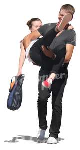joyful young man carrying a woman