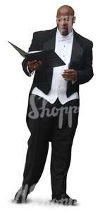 black man in a tuxedo singing 