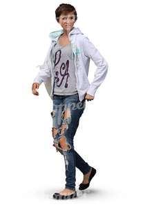 woman in ragged jeans walking