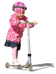 girl with a pink helmet riding a scooter