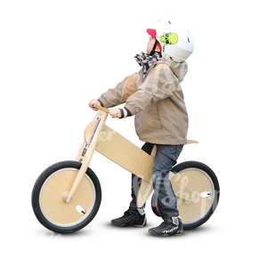 young child riding a likebike